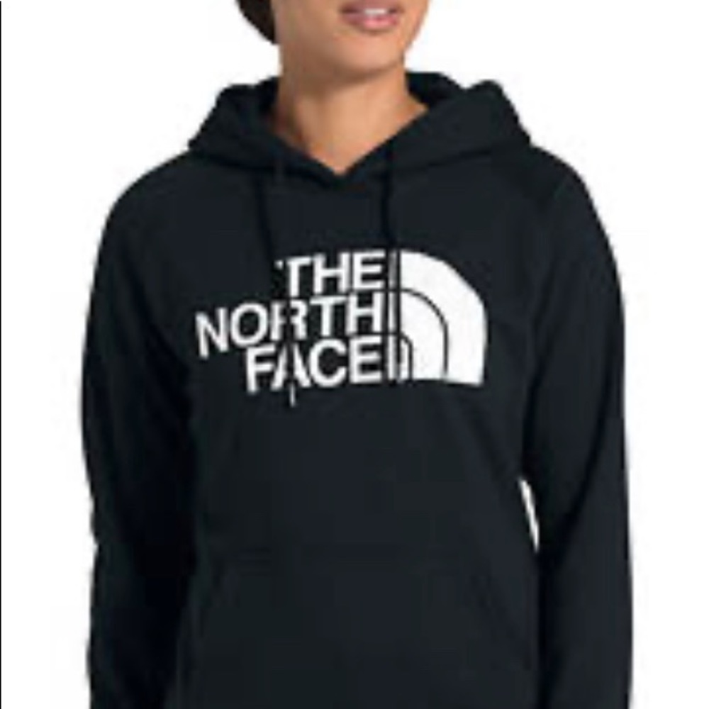 a black and white north face hoodie very warm